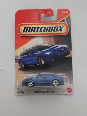 Match blue 2024 Subaru WRX S4 STI toy car